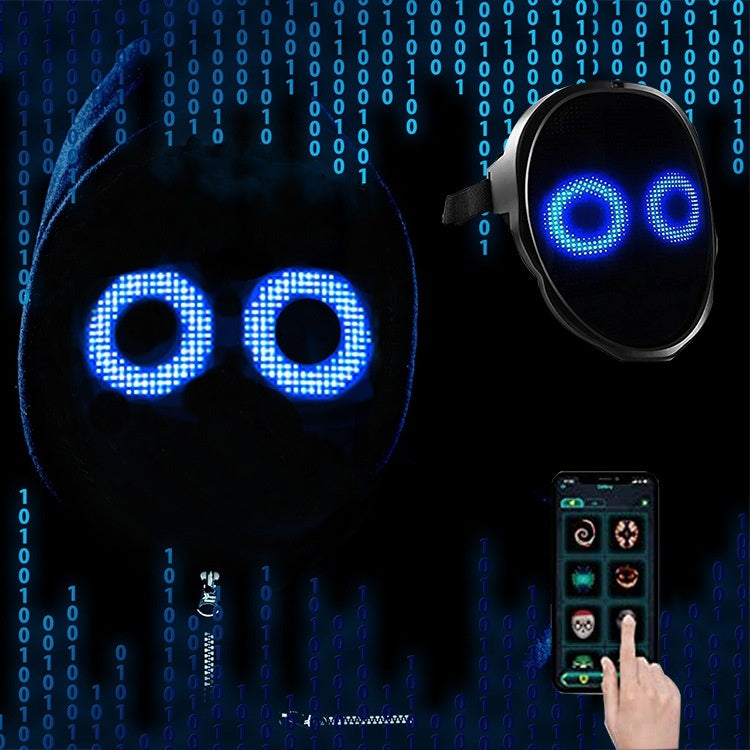 Digital mask with blue LED lights and remote control on a dark background with binary code.