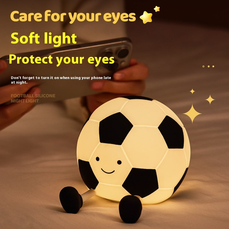 Soccer ball-shaped night light with text about eye care and soft light.