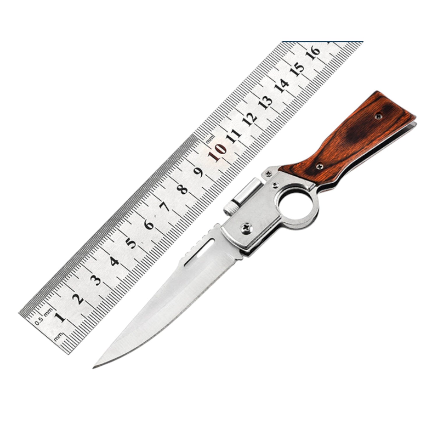 Folding knife with wooden handle and ruler for scale on a white background