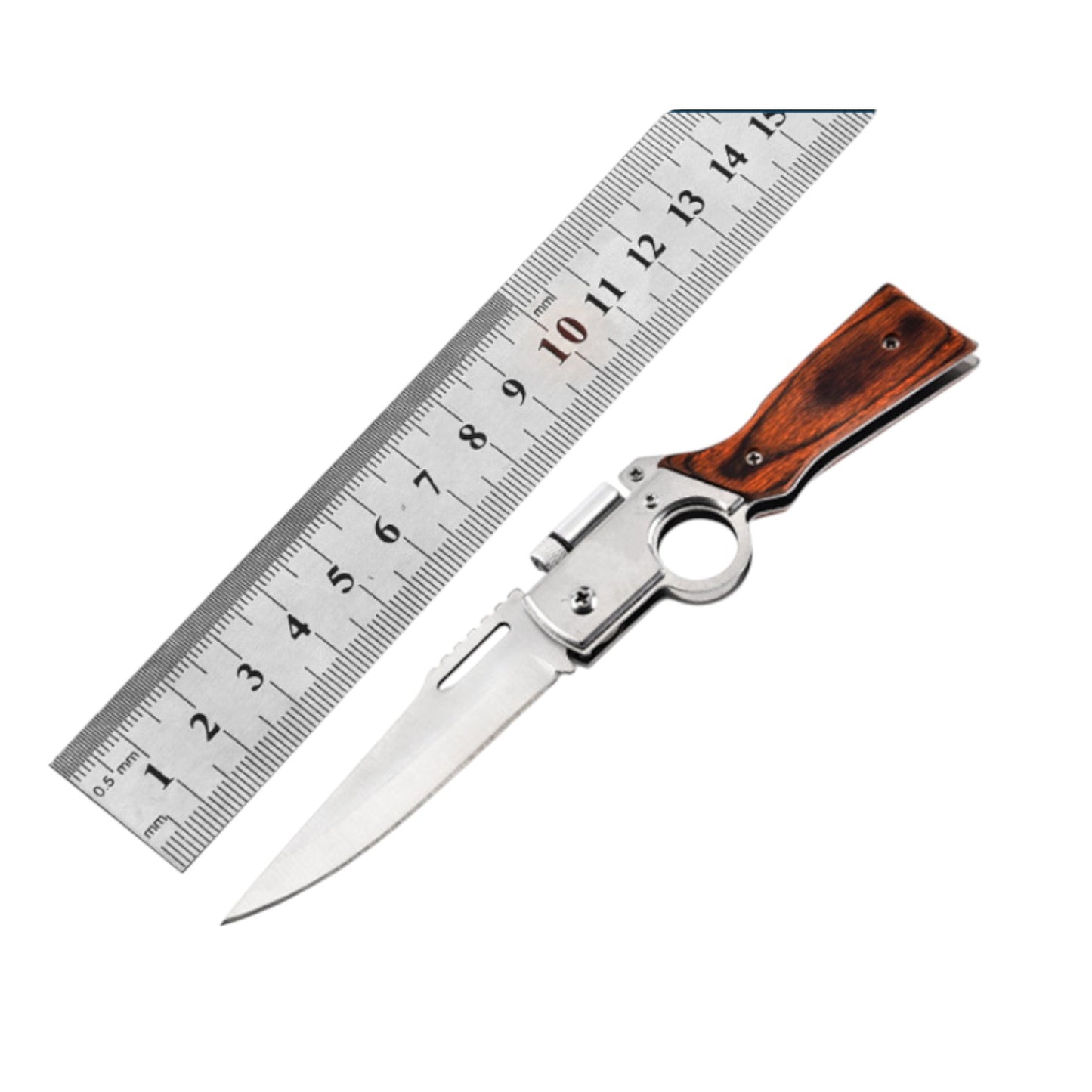 Folding knife with wooden handle next to a ruler on a white background