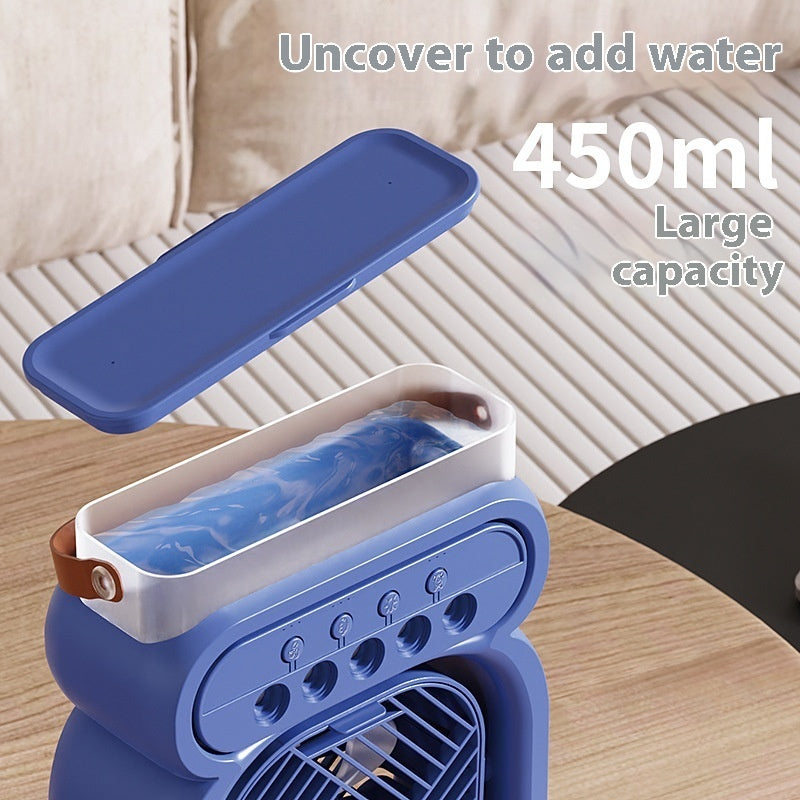 Blue portable fan with water reservoir on a wooden surface