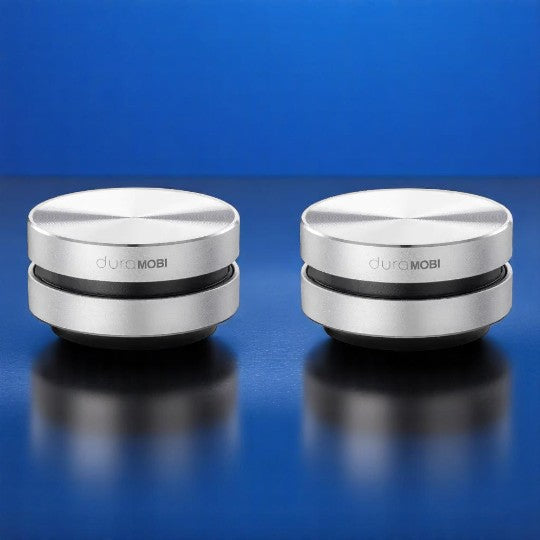 A compact and sleek black mini bone conduction speaker with the brand name 'DURAMOBI' visible on the top surface.