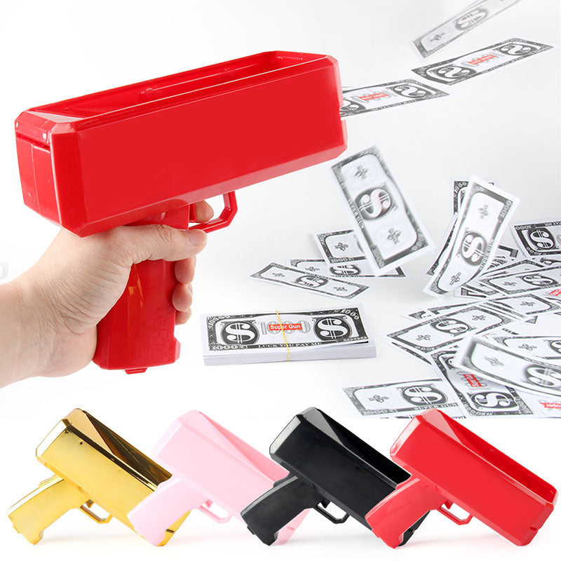 Red money gun toy with printed dollar bills on a white background
