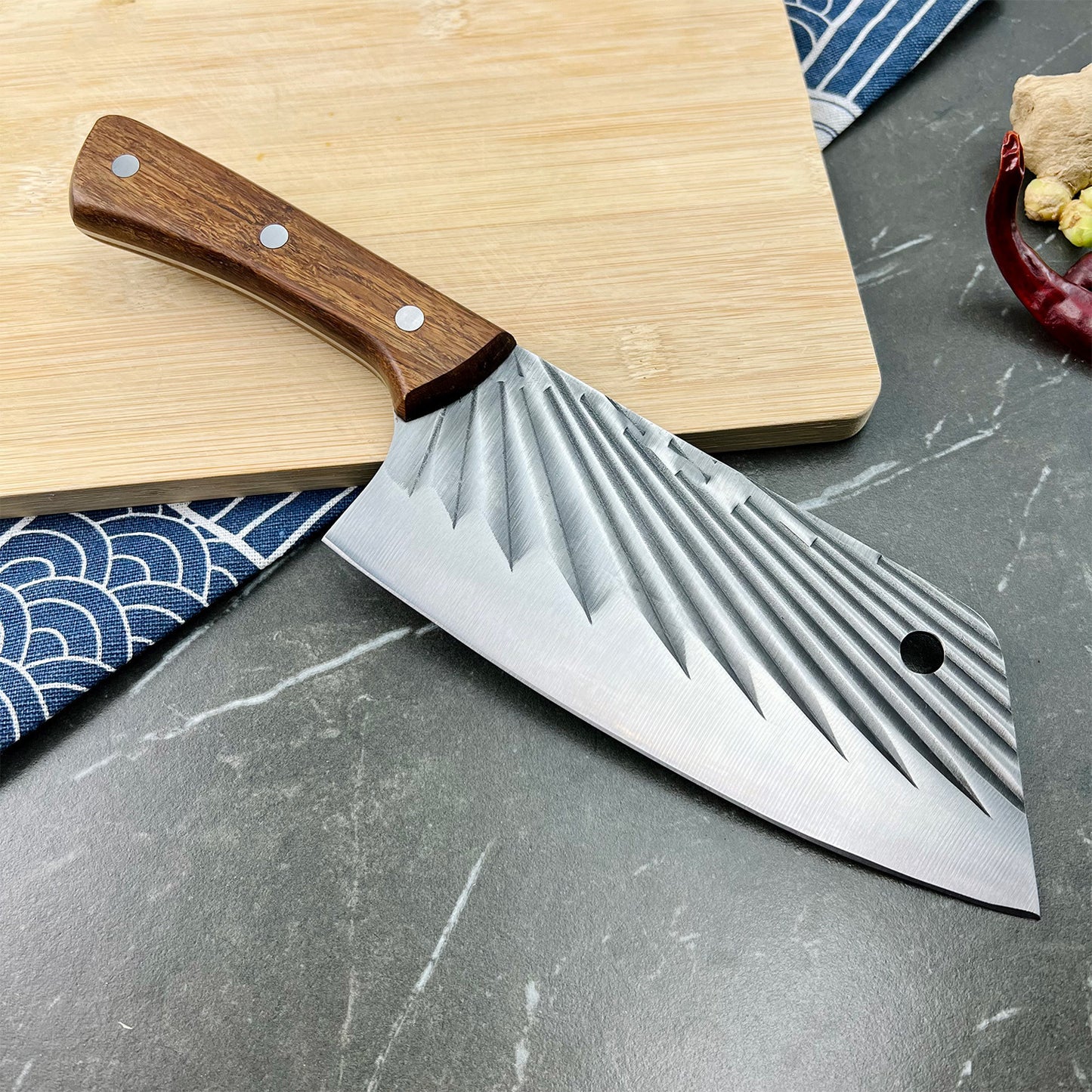 Kamagata knife with wooden handle on a gray surface