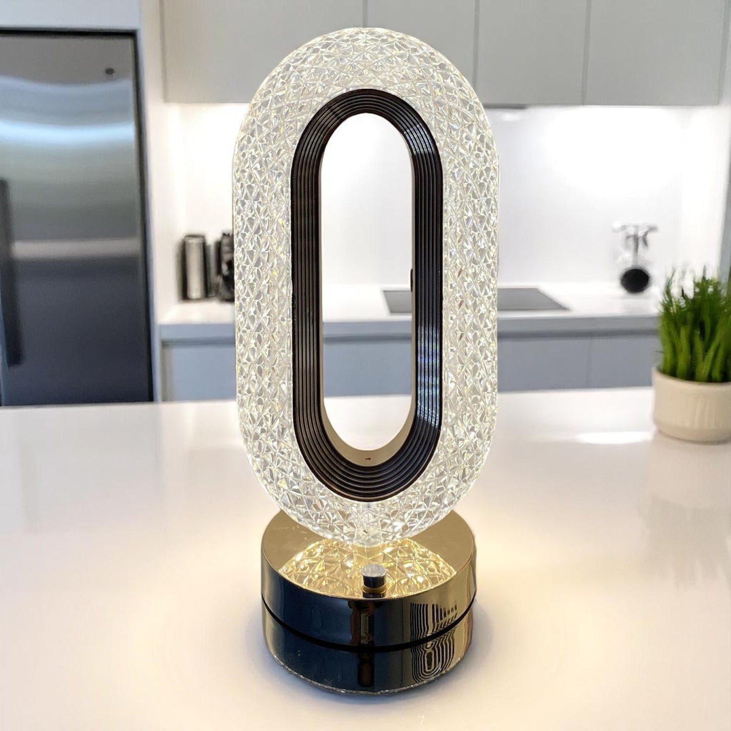 Decorative lamp on a kitchen counter with a modern kitchen background