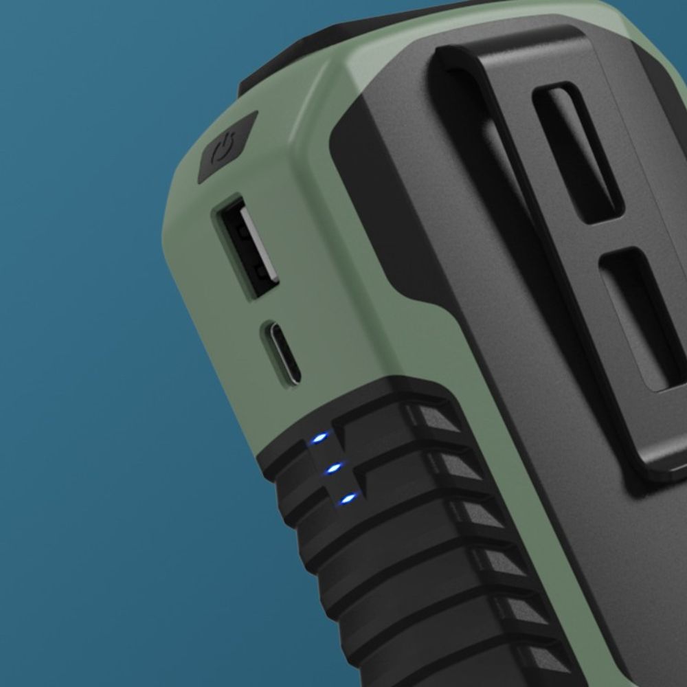 Green and black power adapter on a blue background