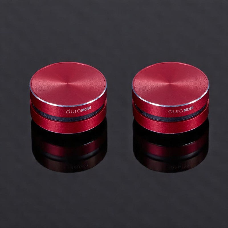 A compact and sleek black mini bone conduction speaker with the brand name 'DURAMOBI' visible on the top surface.