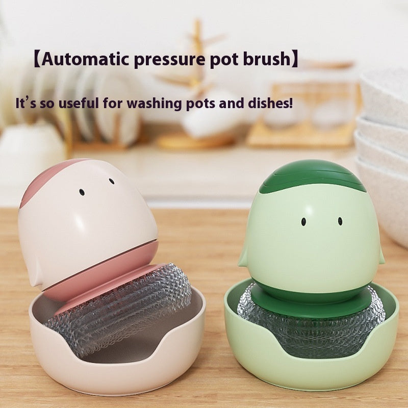 Two automatic pressure pot brushes, one pink and one green, on a wooden surface with kitchen items in the background.