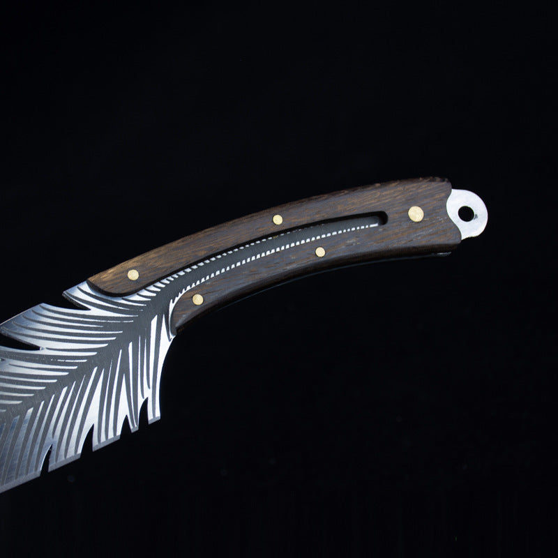 Wooden-handled knife with metal blade on a black background