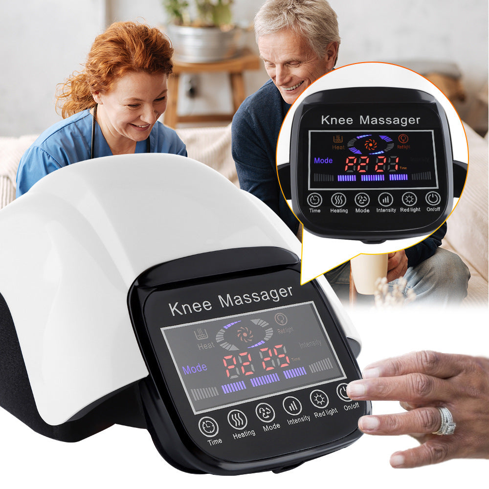 Knee massager with digital display and control panel, shown in use by a person.