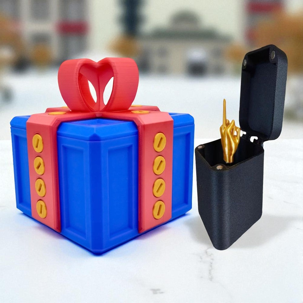 Colorful toy gift box with a black box containing gold-colored items on a blurred background