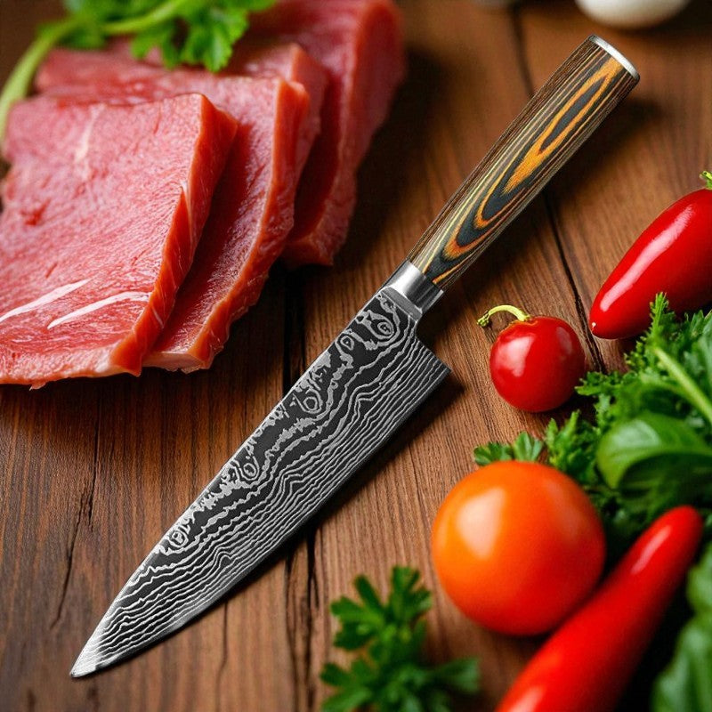 Damascus knife on a wooden surface with sliced meat, tomatoes, and herbs.