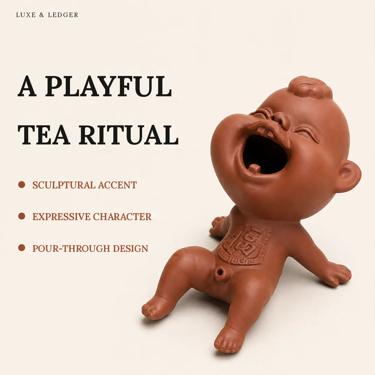 A terracotta-colored ceramic baby figurine with an open mouth, shown on a light beige background with promotional text reading 'A PLAYFUL TEA RITUAL' and bullet points about sculptural accent, expressive character, and pour-through design.