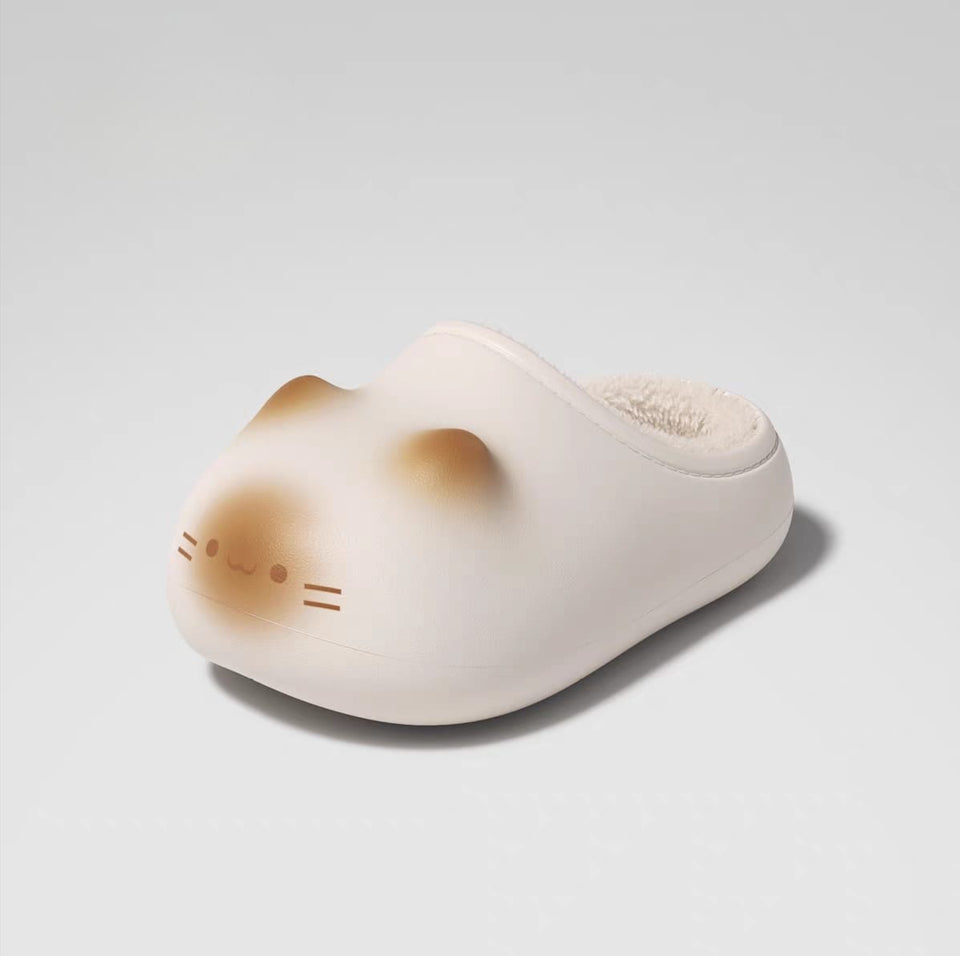 Cute animal-shaped slipper with a neutral background