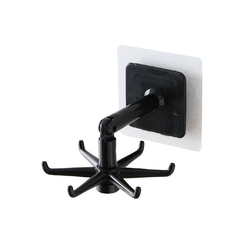 Black wall-mounted coat hook with white square base on a white background