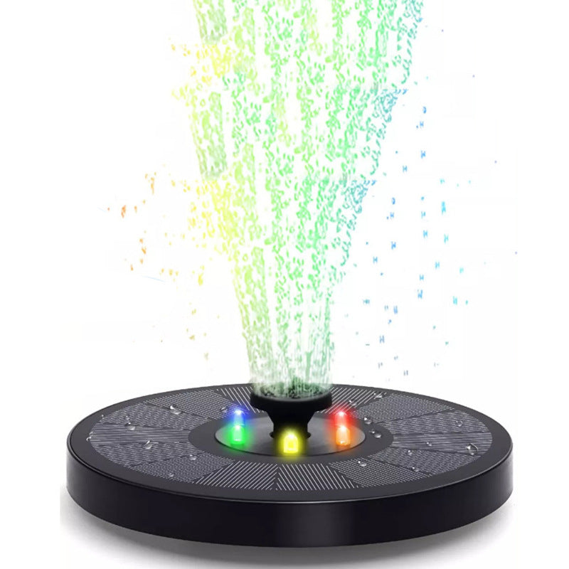 Solar fountain with colorful water sprays on a white background
