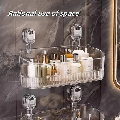 Clear plastic shelf with bathroom products against a marble wall
