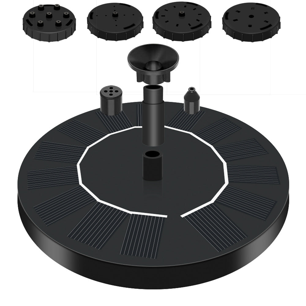 Black circular solar panel with multiple attachments on a white background