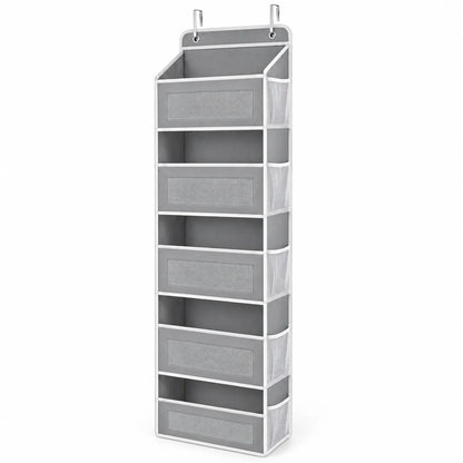 A gray fabric hanging organizer with six compartments, featuring a white frame and metal hanging hooks at the top, shown on a plain white background.