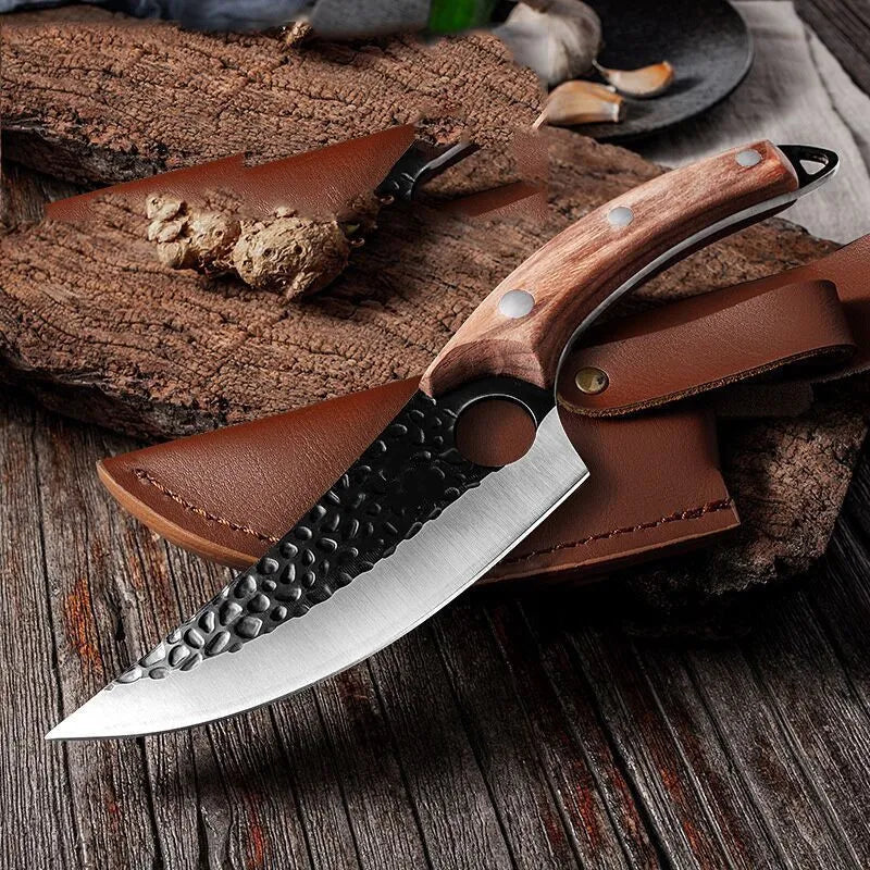 Knife with wooden handle and leather sheath on a wooden surface