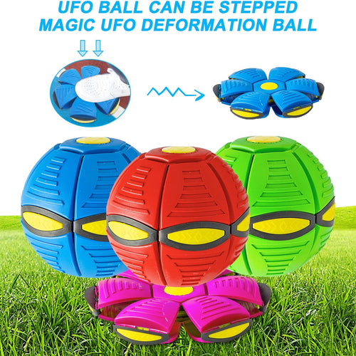 Colorful deformation ball with text on a grass background