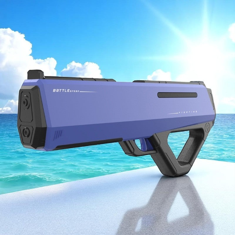 Purple and black toy gun with 'BATTLE' branding on a beach background