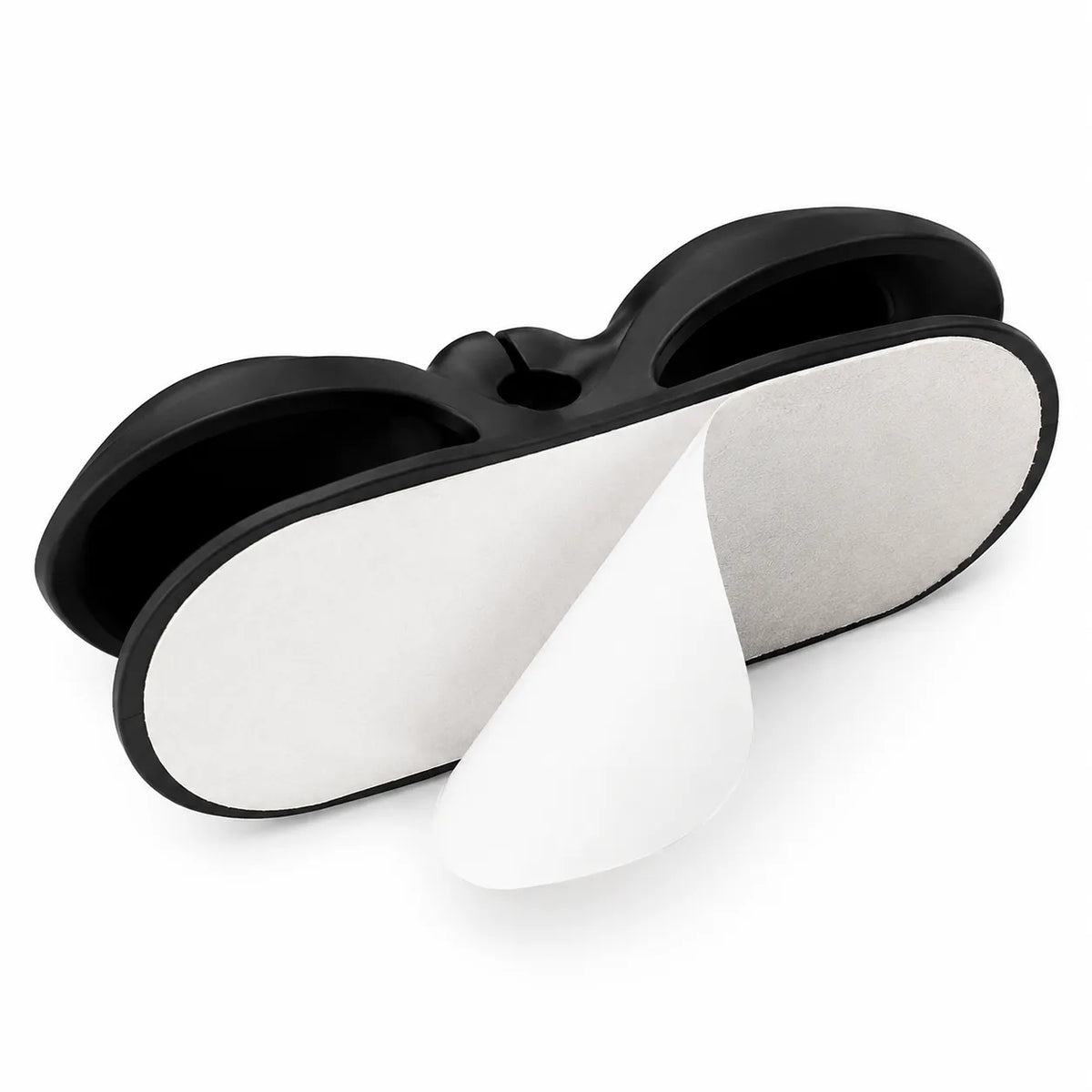 Black silicone adhesive pads with white textured backing sheets, shown on a clean white background.