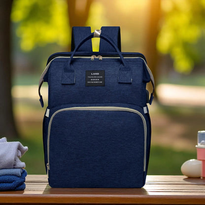 Blue backpack on a wooden surface with a blurred natural background