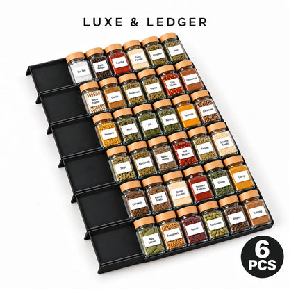 A black 6-piece spice rack organizer holding 30 small glass jars of assorted spices with tan lids and white labels, shown on a white background with the text 'LUXE & LEDGER' and a '6 PCS' badge.