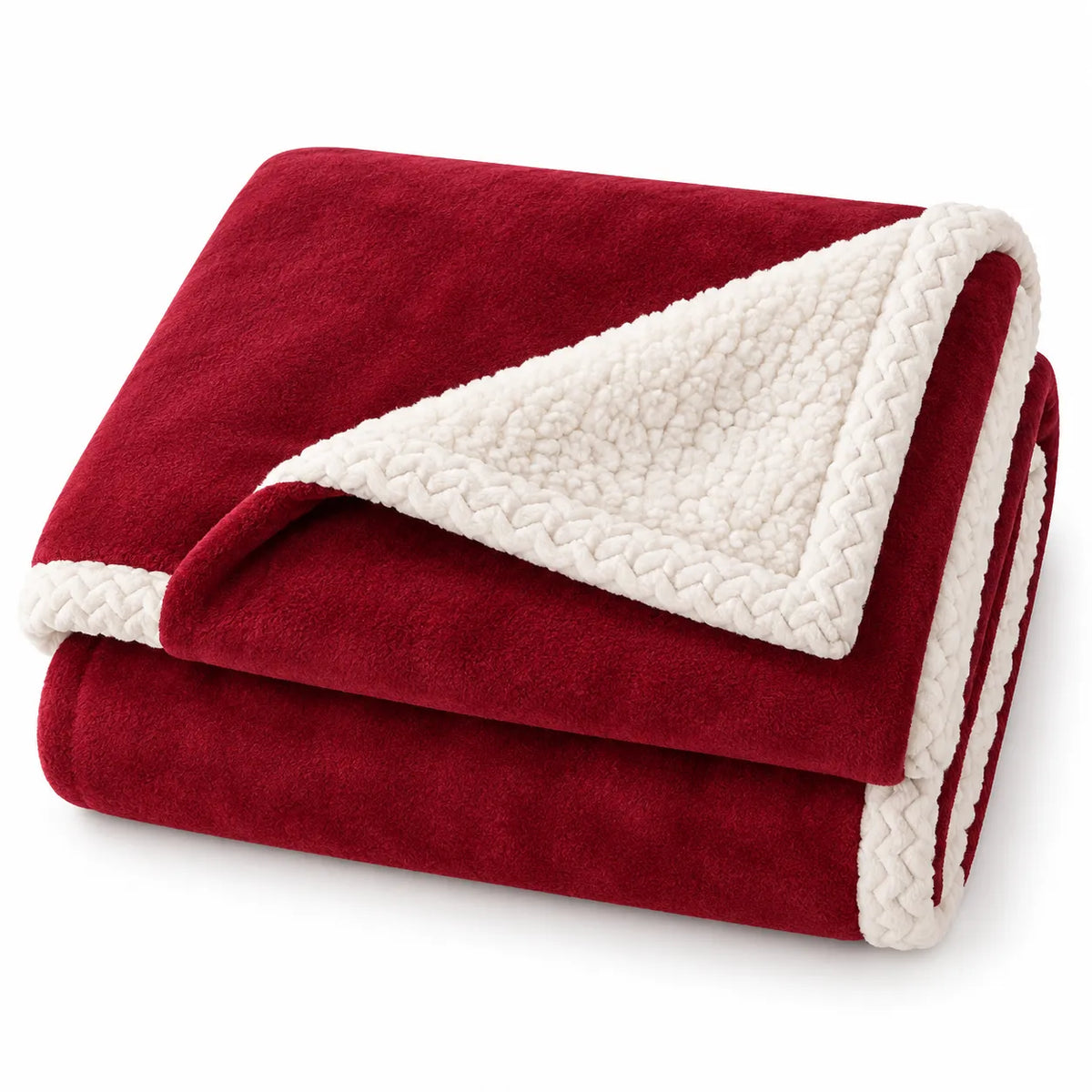 A folded fleece blanket with a deep red exterior and a cream sherpa lining, showing a braided border trim, set against a plain white background.