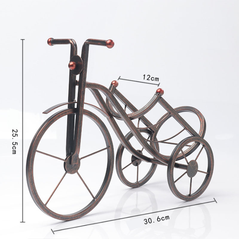 Small model of a vintage bicycle with dimensions indicated on a white background