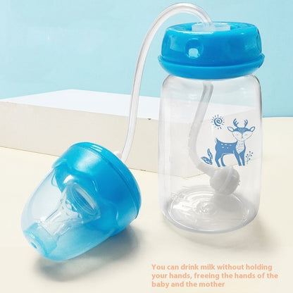 Clear baby bottle with blue cap and deer design on a light background