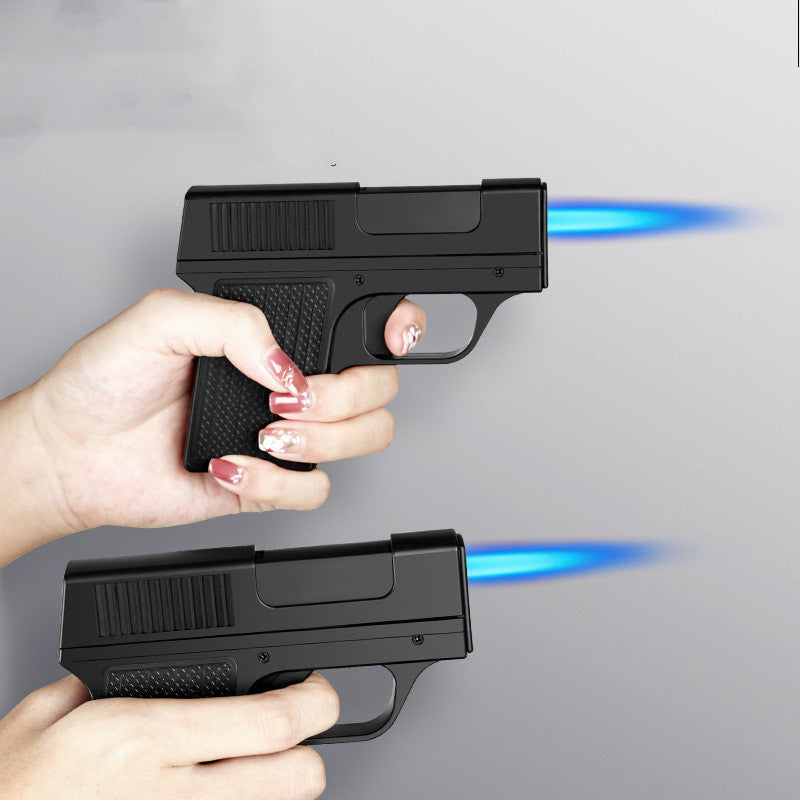 Two hands holding black toy guns with blue light effects on a gray background
