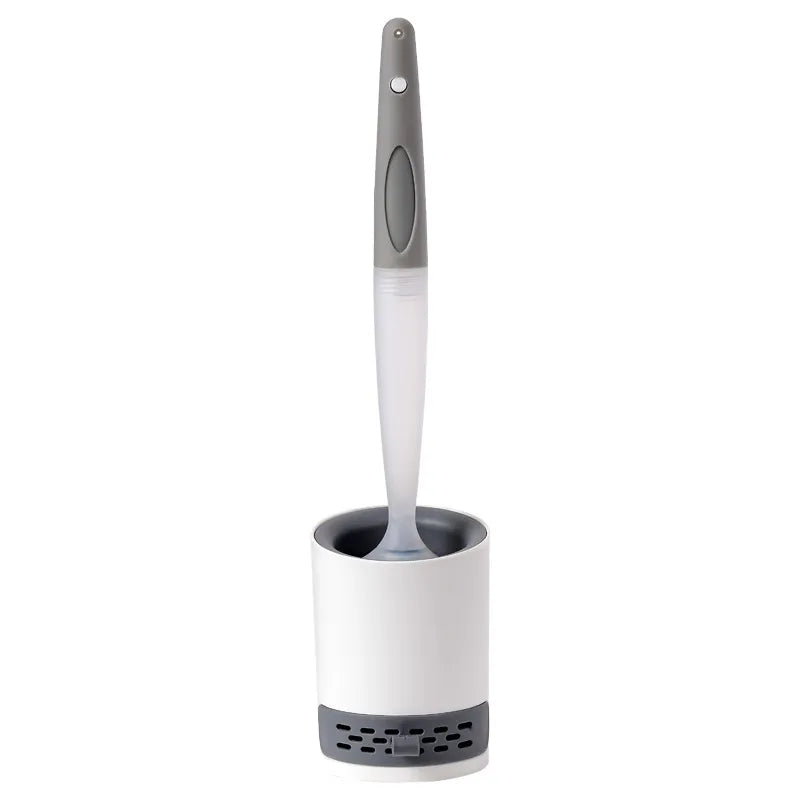 A bathroom toilet brush with a gray and white handle, standing upright in a white cylindrical holder with a dark gray base, isolated on a white background.