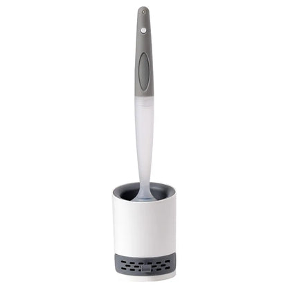 A bathroom toilet brush with a gray and white handle, standing upright in a white cylindrical holder with a dark gray base, isolated on a white background.