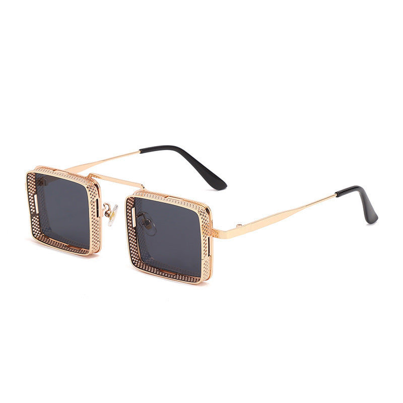 Gold-framed sunglasses with black lenses on a white background