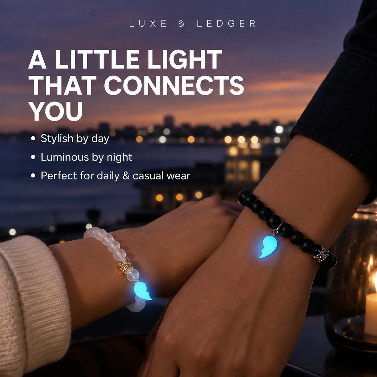 Two people holding hands at dusk, each wearing a beaded bracelet with a glowing blue heart-shaped light. Large text reads 'A LITTLE LIGHT THAT CONNECTS YOU' with 'LUXE & LEDGER' at the top, over a city waterfront sunset background.