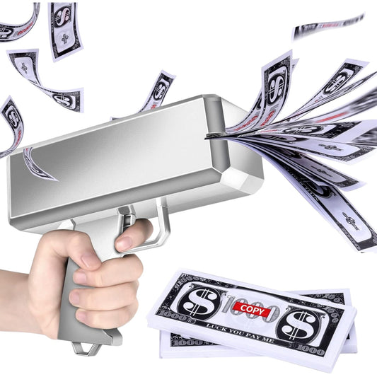 Hand holding a gun-shaped money dispenser with dollar bills flying out on a white background
