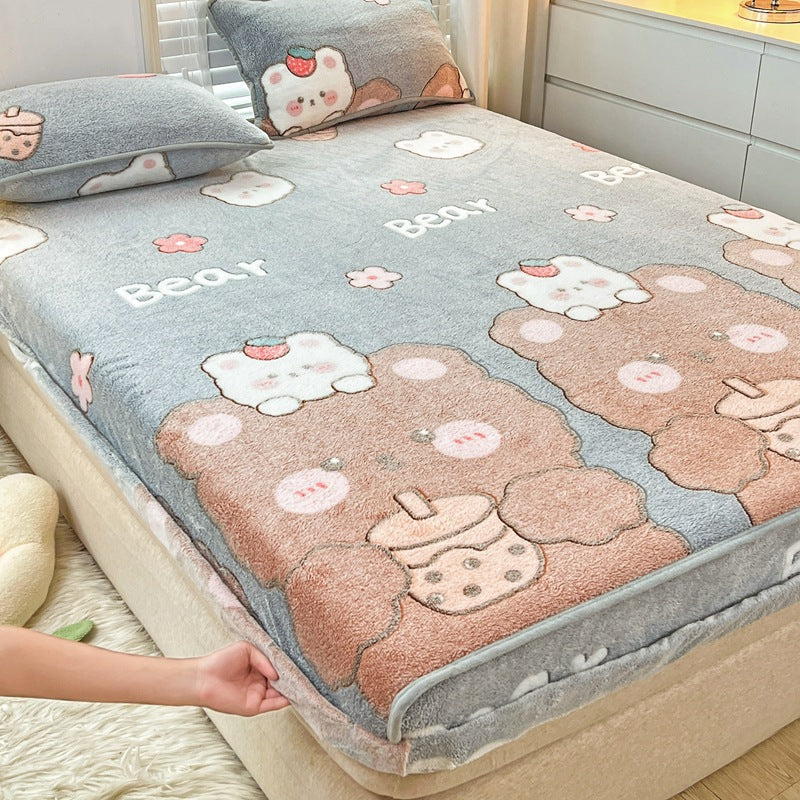 Flannel quilt with bear design on a bed in a bedroom setting
