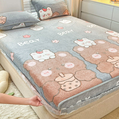Flannel quilt with bear design on a bed in a bedroom setting