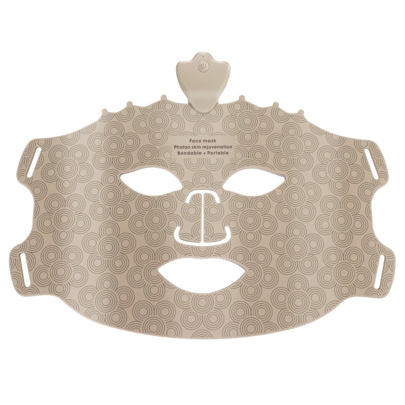 Beige face mask with circular pattern on a white background