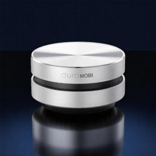 A compact and sleek black mini bone conduction speaker with the brand name 'DURAMOBI' visible on the top surface.