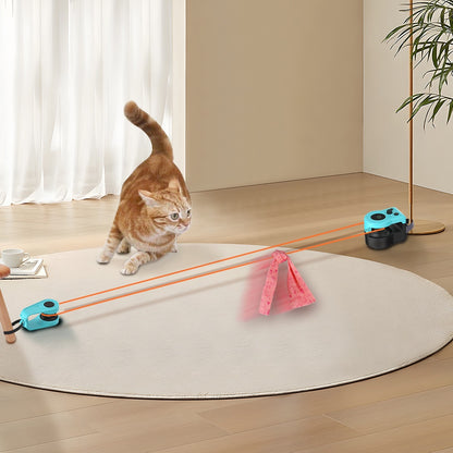 Cat playing with a toy on a wooden floor in a home setting
