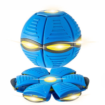 Blue and yellow toy ball with glowing eyes on a white background