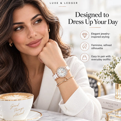 A woman in a white sweater wears a white and rose gold Luxe & Ledger watch and bracelet set, posed in a bright cafe setting with a latte and decorative elements.