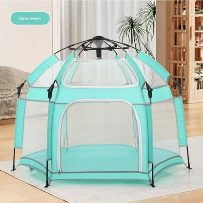 Lime green playpen with mesh sides on a wooden floor.