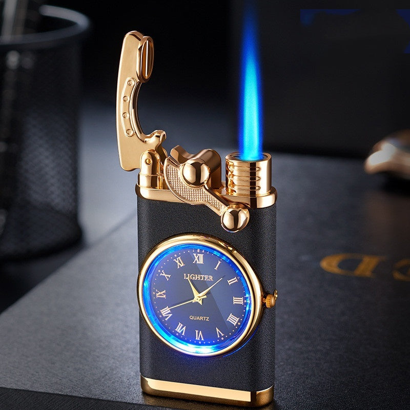 Gold and black lighter with clock face and blue flame on a dark surface