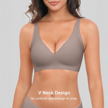 Woman wearing a beige V-neck bralette on a gray background