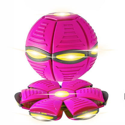 Pink toy robot with glowing eyes and mouth on a white background
