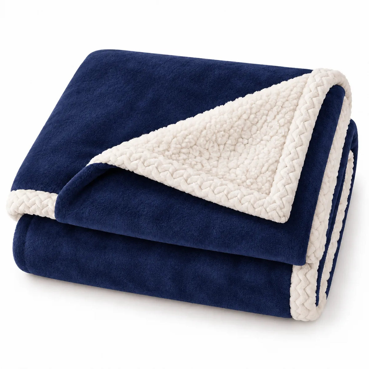 A folded fleece blanket with a rich blue sherpa side and a cream sherpa reverse side, finished with braided trim, shown on a clean white background.